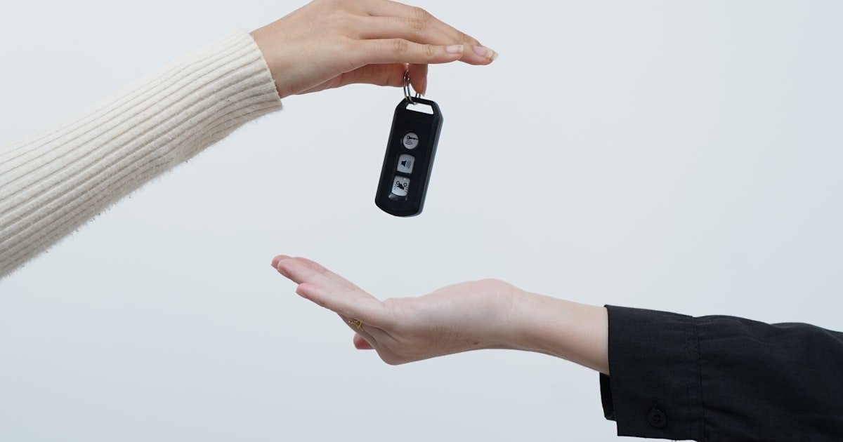 Photo representing a car loan payment being reviewed