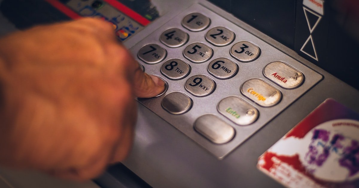 Photo representing an ATM withdrawal while traveling