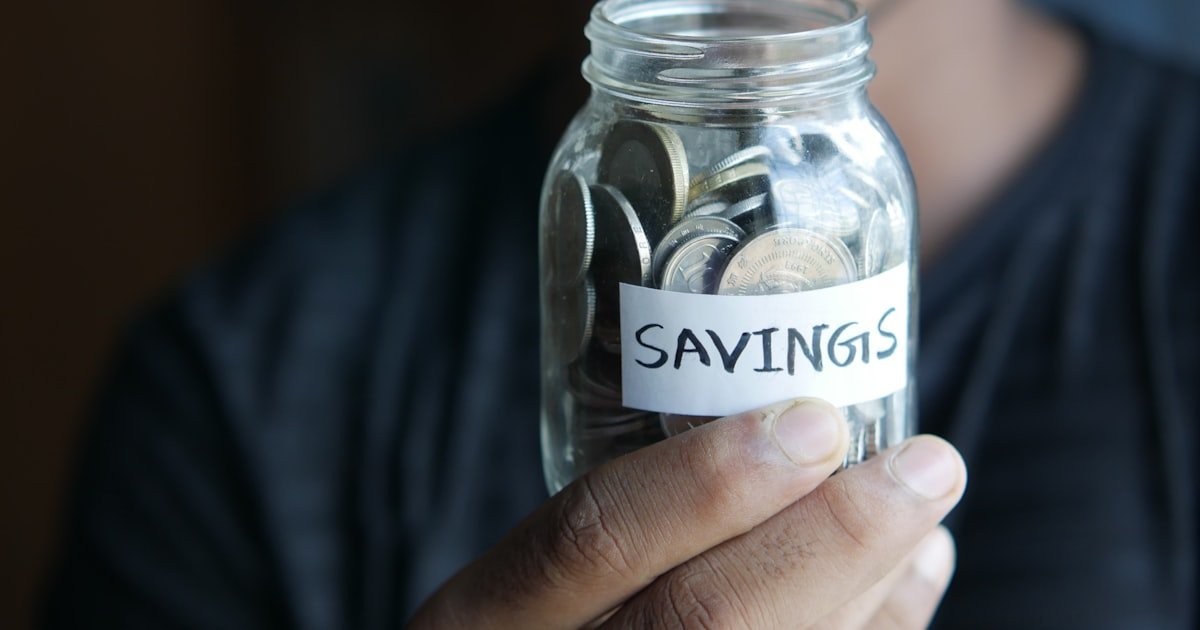 Photo representing separate savings jars for different goals